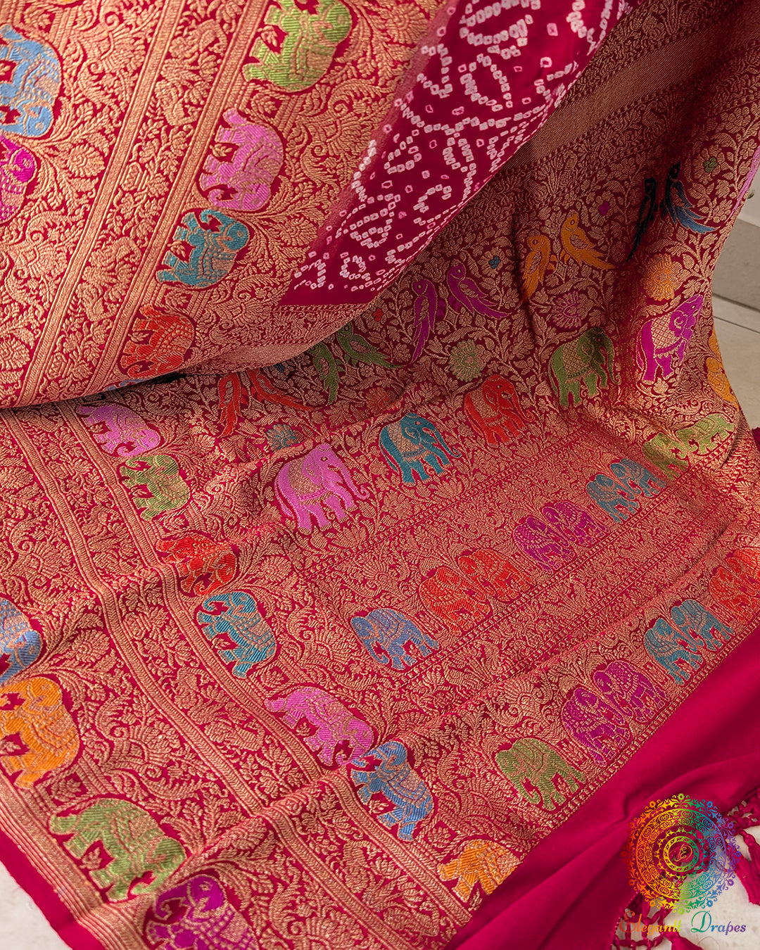Detailed view of Shikargah-inspired motifs and woven zari detailing on saree