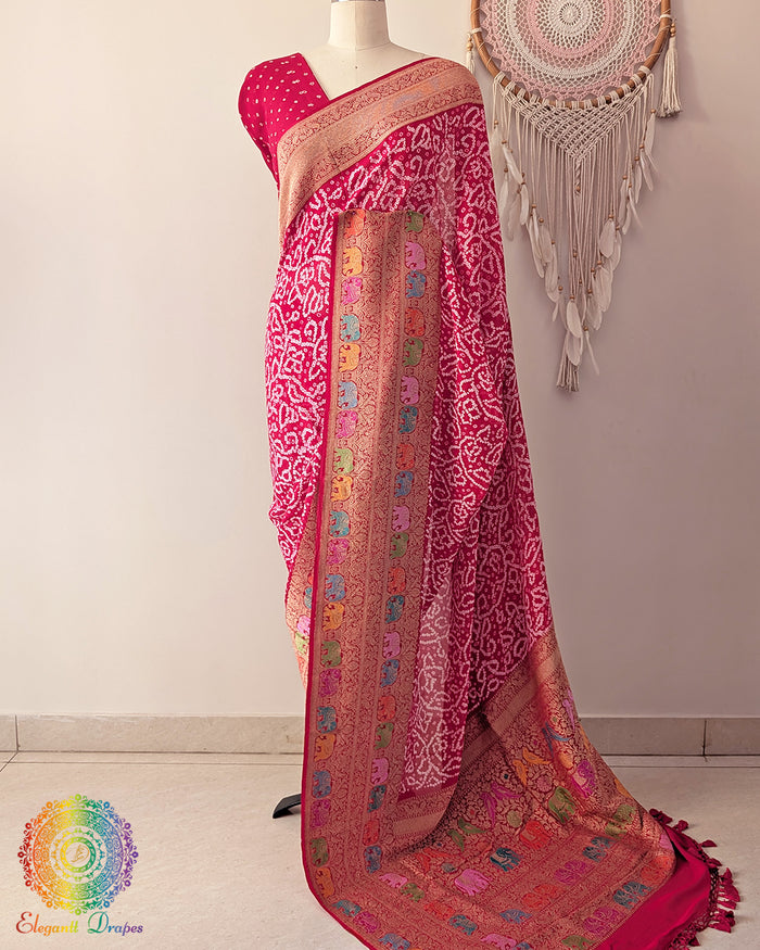 Red Banarasi khaddi georgette Shikargah bandhani saree on mannequin showing full drape