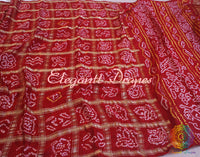 Close up of Bandhani work on red Gajji silk Gharchola saree