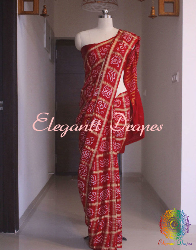 Red Gharchola saree pallu with Bandhej detailing