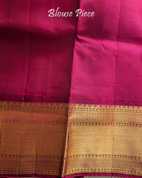 Matching blouse piece in royal blue Kanjivaram silk with woven zari detailing