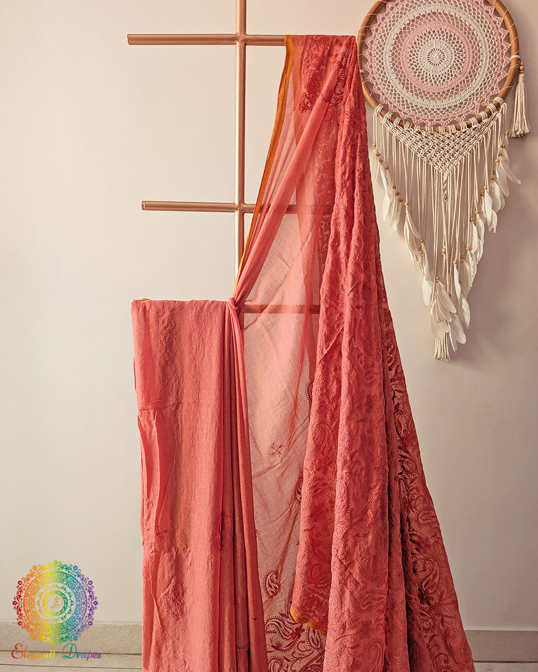 Rust brown Bengal cotton saree fabric close up highlighting soft weave and embroidery-inspired detailing