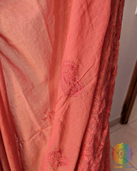 Close up of Chikankari-inspired paisley embroidery on rust brown Bengal cotton saree