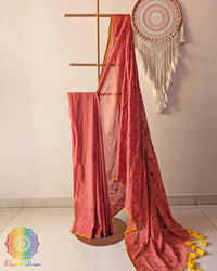 Rust brown Bengal cotton saree with Chikankari-inspired threadwork showing elegant drape
