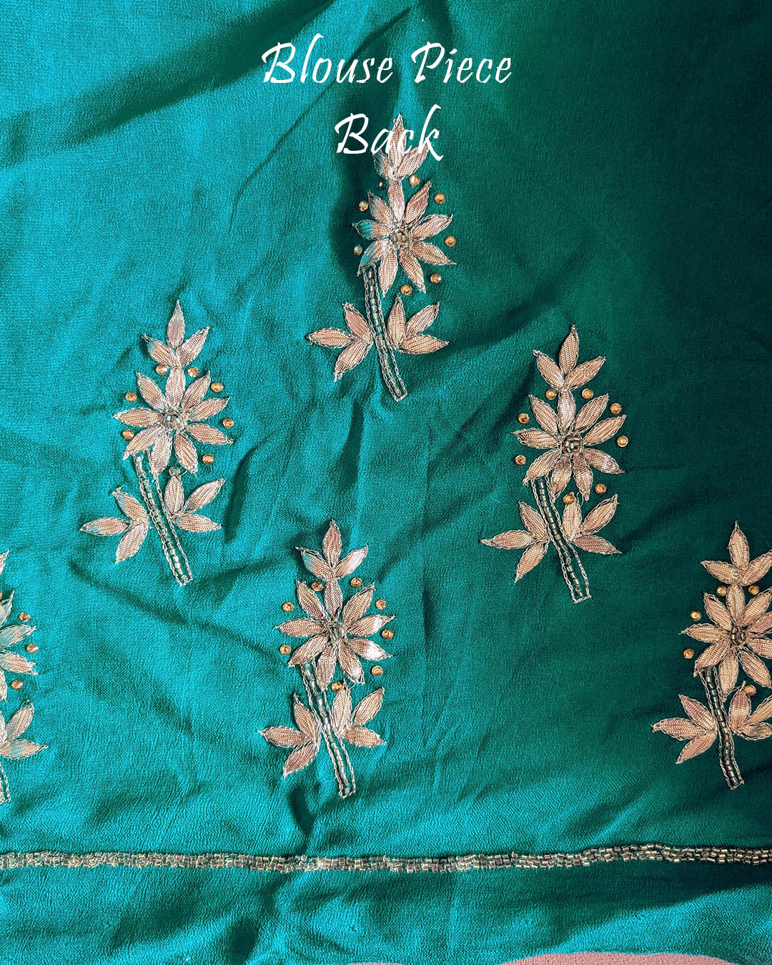 Matching blouse back of the Turquoise Bandhani Gota Patti Pure Chinon Saree with coordinated Gota Patti detailing