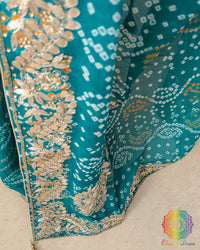 Close-up of handcrafted Gota Patti embroidery on the pallu of the Turquoise Bandhani Pure Chinon Saree