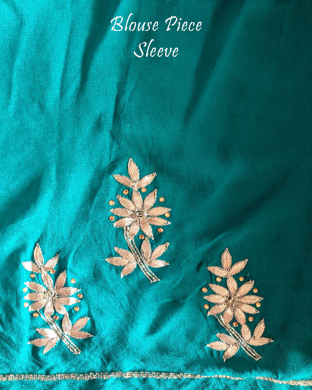 Close-up of the blouse sleeve featuring handcrafted Gota Patti embroidery on the Turquoise Pure Chinon Saree