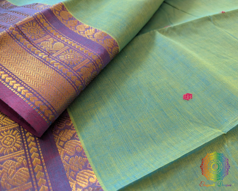 Close up of border on sea green Kanchi cotton saree highlighting weave detail