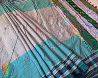 Close-up of diagonal Lambani embroidered bels and floral bootas on the Sea Green Ilkal cotton saree