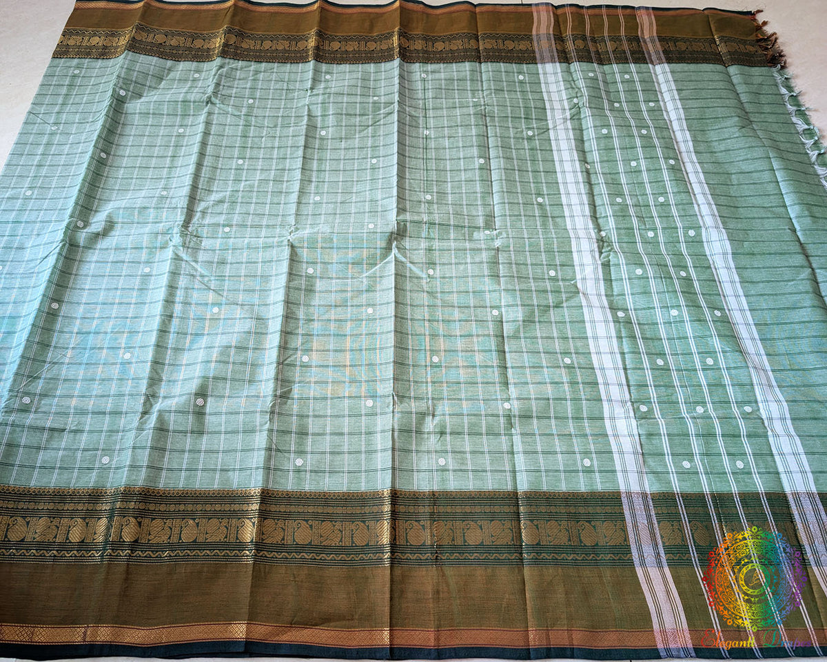 Full sea green Kanchi cotton checkered saree laid open showcasing overall design and drape