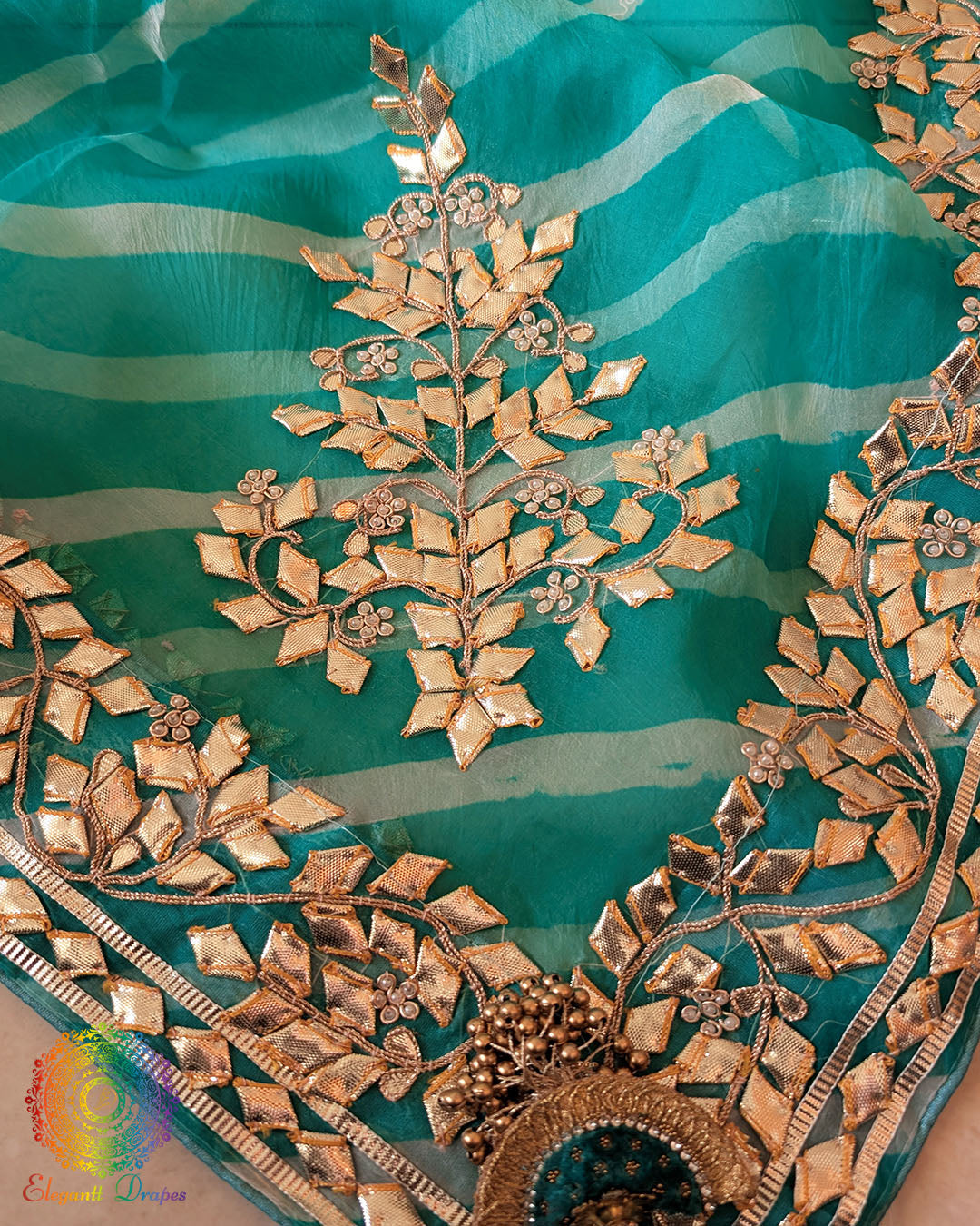 Sea Green Organza Saree – Detailed view of the traditional Leheria design enhanced with intricate handcrafted Kachha Gota detailing