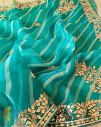 Sea Green Organza Leheria Saree – Detailed body view showcasing the graceful wave-like Leheria pattern and shimmering Kachha Gota work