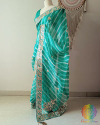 ea Green Organza Leheria Saree with Kachha Gota Handwork – Side Drape highlighting the lightweight Organza fabric and detailed Leheria design
