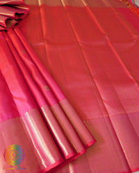 Close-up of the palla of the Shot Pink Pure Kanjivaram Silk Saree, highlighting the 2gm gold zari detailing against the pink-orange shot silk.