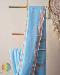 Sky blue Bengal cotton saree body close up highlighting fabric texture with zari border detail