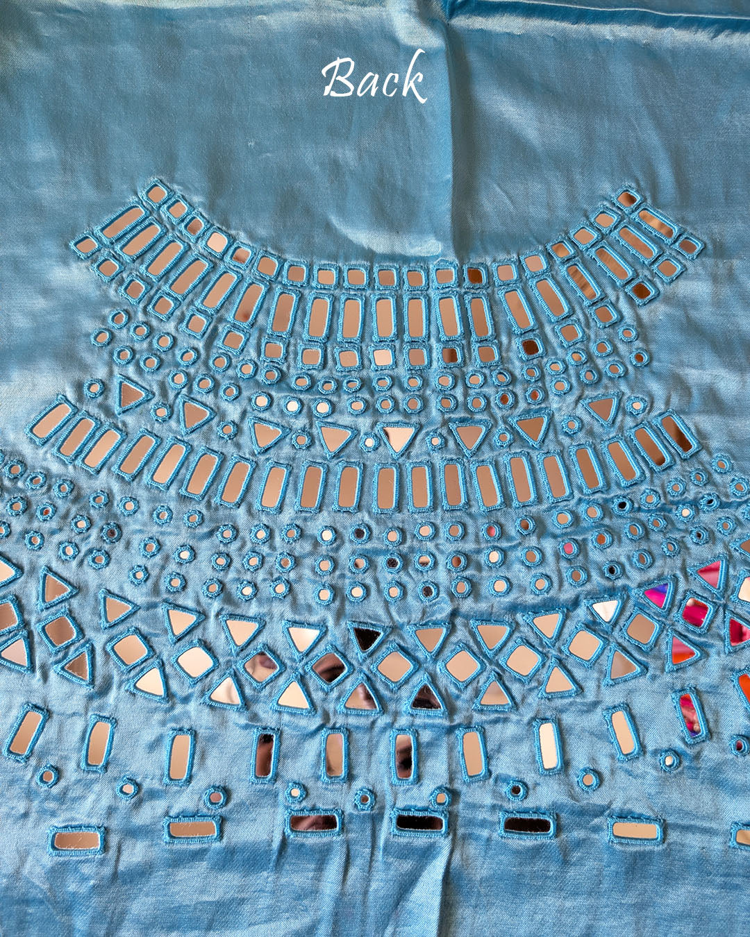 Close-up of Kutch mirror work on the back of Blue Mashru Silk Blouse Piece