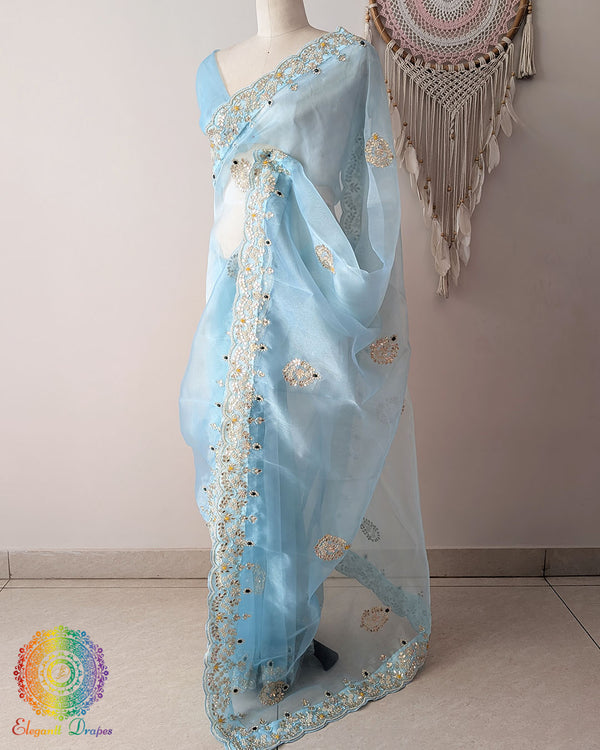 Sky Blue Organza Saree side view with Gota Patti Kundan and Pearl Handwork