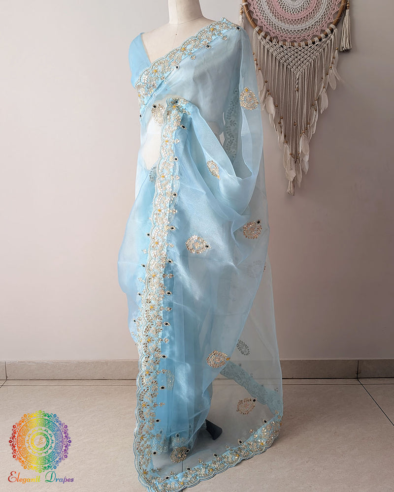 Sky Blue Organza Saree side view with Gota Patti Kundan and Pearl Handwork