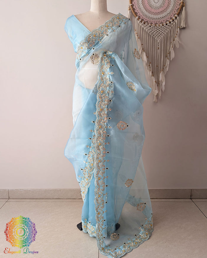 Grand palla view of Sky Blue Organza Saree with Gota Patti Kundan and Pearl Handwork