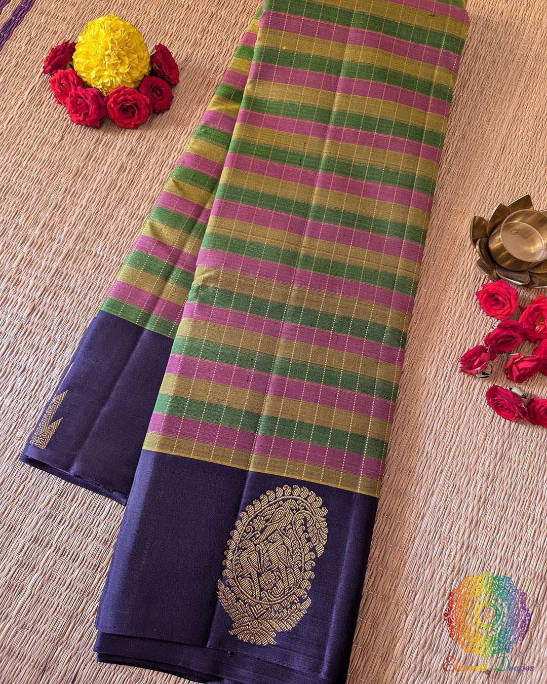 Small Checkered Pure Kanjivaram Handloom Silk Saree – Folded View showcasing the multicolour small-check pattern, lustrous silk texture and contrasting blue border with traditional 2gm gold zari detailing.