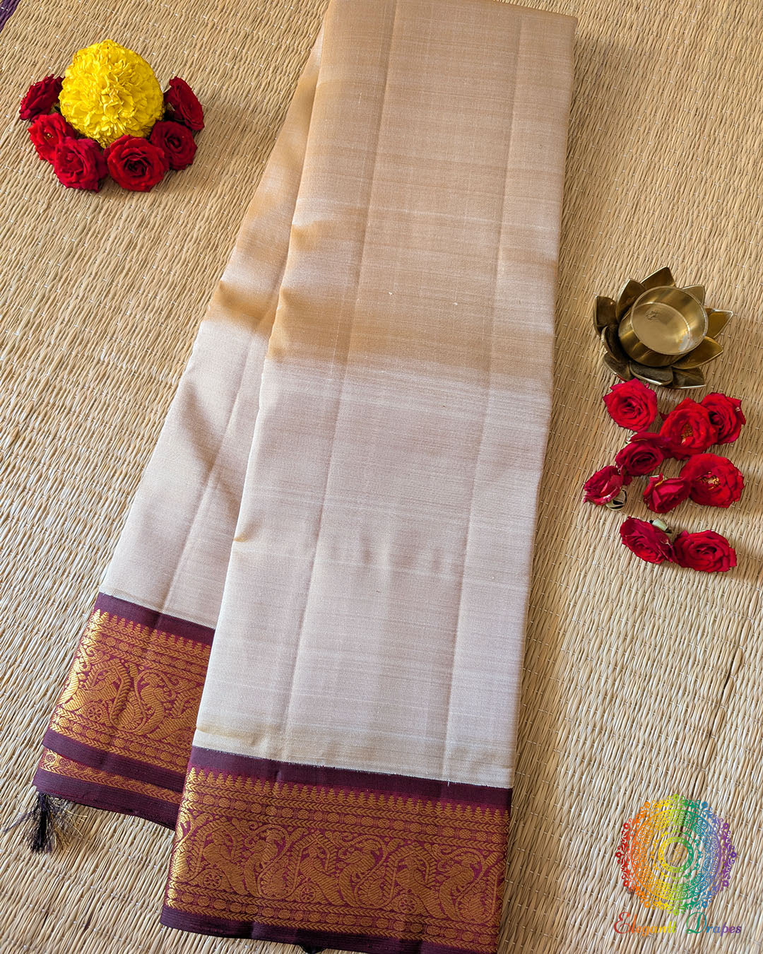 Taupe Maroon Pure Kanjivaram Handloom Silk Saree – Folded View showcasing the elegant taupe silk body, contrasting maroon border and traditional 2gm gold zari detailing.