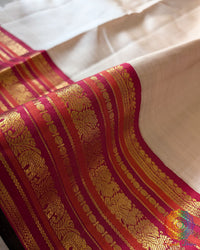 Detailed view of the woven 2-Gram Gold Zari border on the Taupe Pure Kanjivaram Silk Saree
