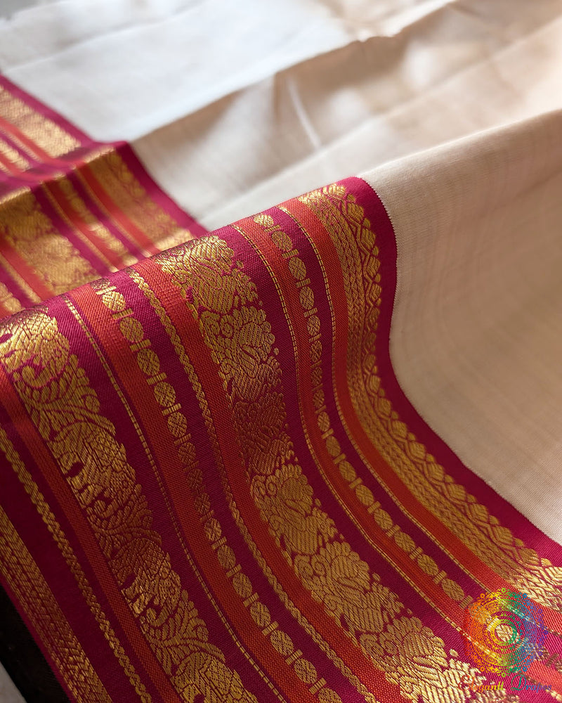Detailed view of the woven 2-Gram Gold Zari border on the Taupe Pure Kanjivaram Silk Saree