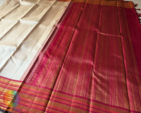 Close-up of the fabric showcasing the elegant weave and 2-Gram Gold Zari details of the Taupe Pure Kanjivaram Silk Saree