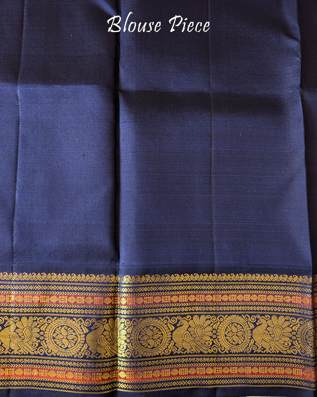 Blouse piece paired with the Teal Blue Pure Kanjivaram Handloom Silk Saree, displaying the coordinating fabric and colour for a traditional ethnic ensemble.