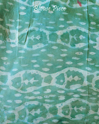 Blouse piece of the Terracotta Pink Nashpal Pomegranate Ajrakh Modal Tussar Silk Saree, showing its coordinating terracotta pink shade and matching Ajrakh print.