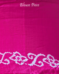 Matching Rani Pink blouse piece of the Turquoise Blue Pure Gajji Silk Bandhani Saree