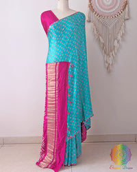 Turquoise Blue Gajji Silk Bandhani Saree with pink Bandhani motifs