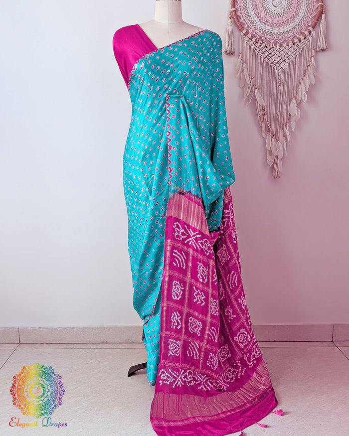 Turquoise Blue Pure Gajji Silk Bandhani Saree with Gharchola Pallu front drape