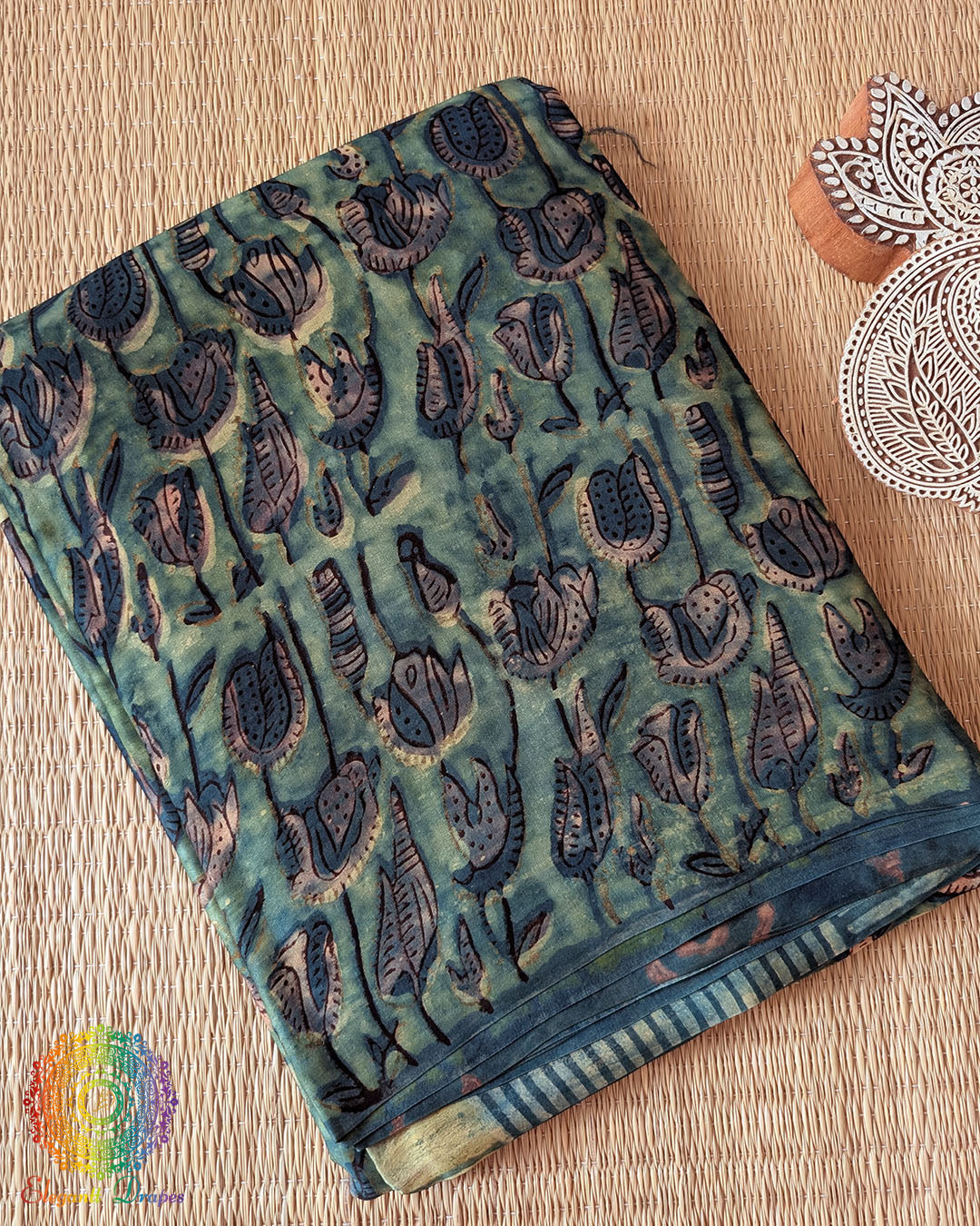 Turquoise Nashpal Pomegranate Modal Tussar Saree folded view