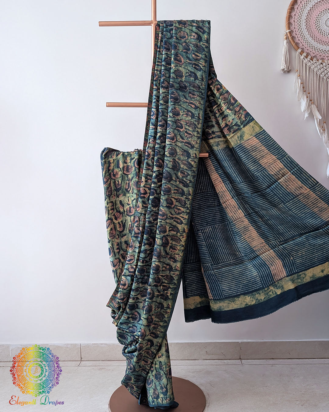 Open pallu view of Turquoise Nashpal Pomegranate Modal Tussar Saree
