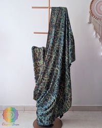 Turquoise Modal Tussar Saree draped with Pomegranate Nashpal dye