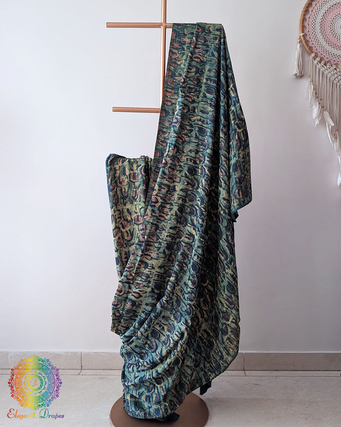 Turquoise Modal Tussar Saree draped with Pomegranate Nashpal dye
