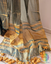 Pom pom detailing on turquoise saree