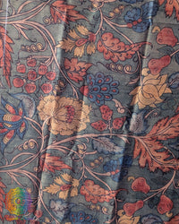 Close-up of intricate hand-painted Kalamkari motifs on Turquoise Pure Tussar Silk dupatta