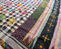 Detailed Lambani embroidered motifs on Black Checked Ilkal Cotton Saree