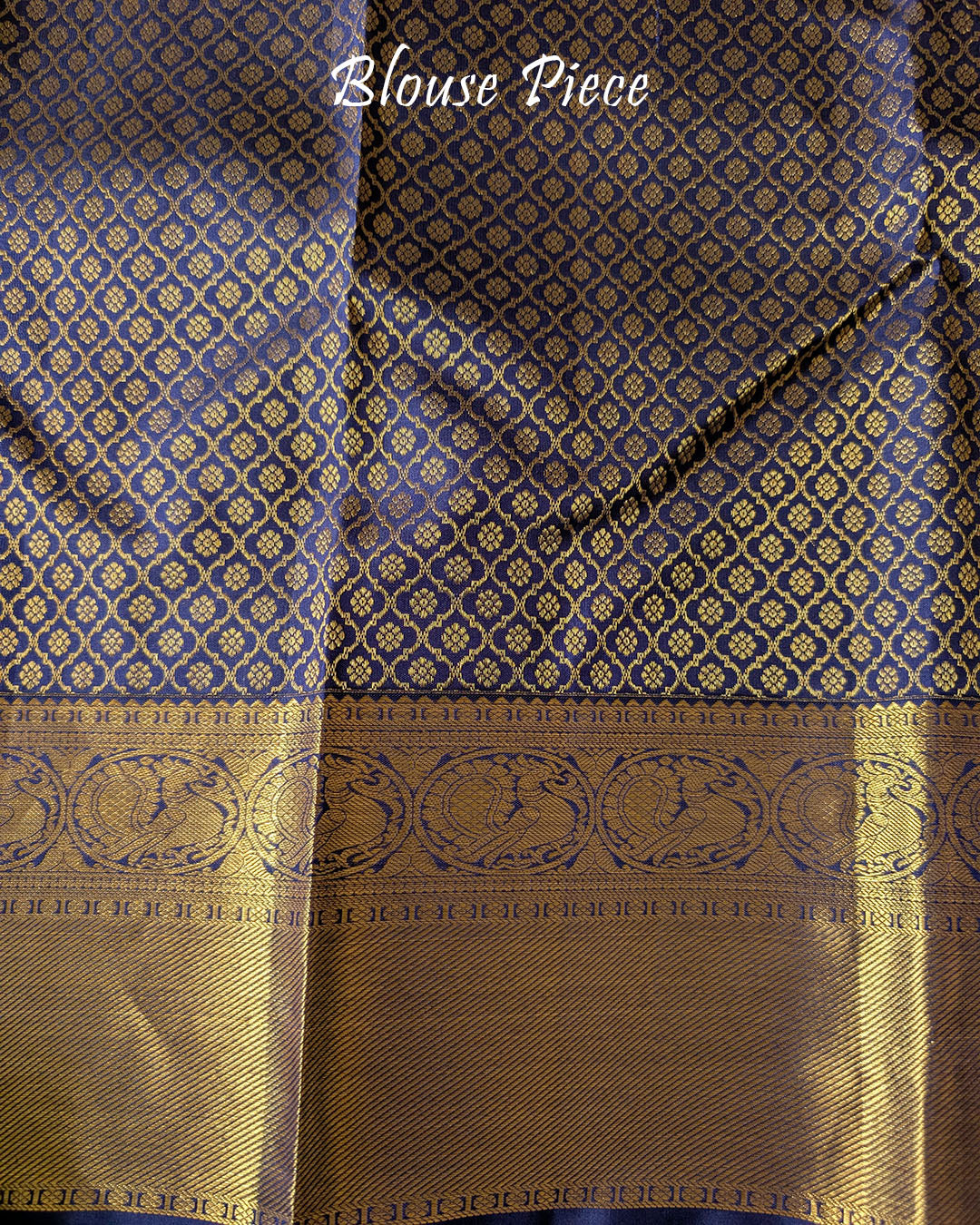 Matching blouse piece in off white and blue Kanjivaram silk with zari detailing