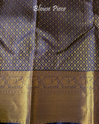 Matching blouse piece in off white and blue Kanjivaram silk with zari detailing