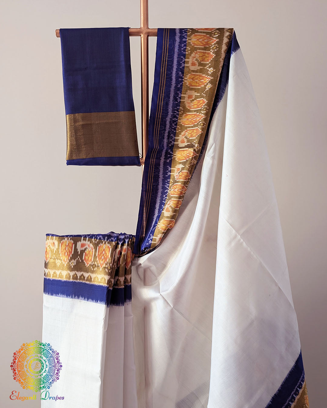 White Blue Handwoven Mulberry Silk Patola Saree – Body Pattern Close-Up showcasing the detailed white and blue Patola motifs across the saree body, highlighting the intricate patterns and fine handwoven silk texture.