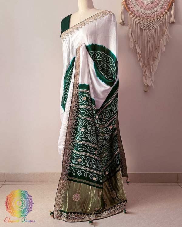 Side angle view of white and green gaji silk Rasmandal saree showcasing elegant silk drape