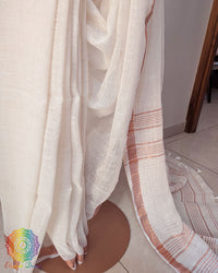 Pleats detail of ivory white linen saree showing texture and fall