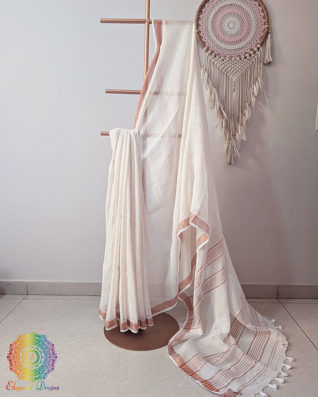 Ivory white linen saree body close up highlighting texture and sequin accents