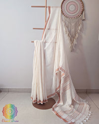 Ivory white linen saree body close up highlighting texture and sequin accents