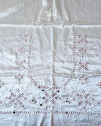 Close-up of Kutch mirror work on the back of White Mashru Silk Blouse Piece