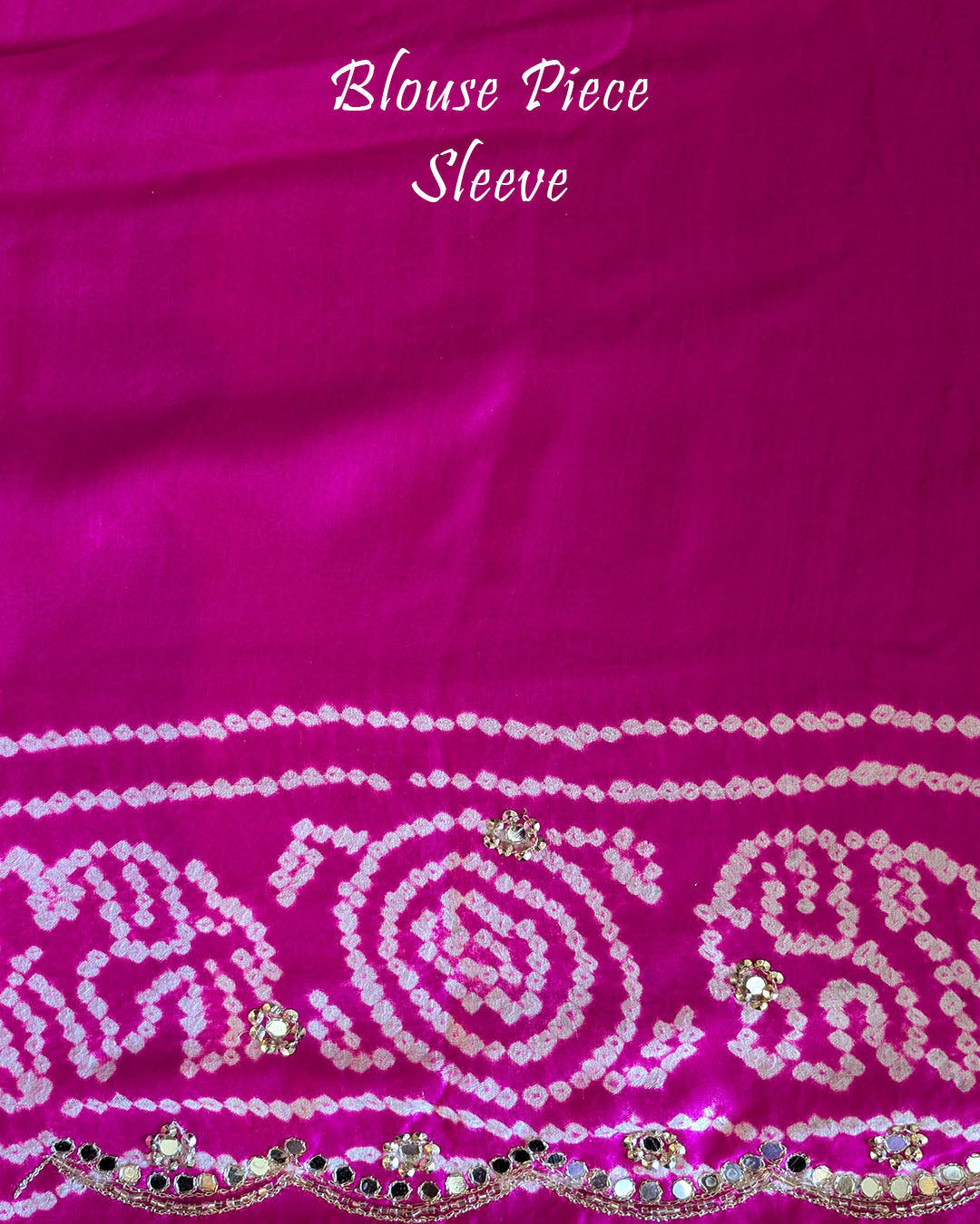 Matching blouse sleeve showcasing coordinated gota patti work and fabric detailing