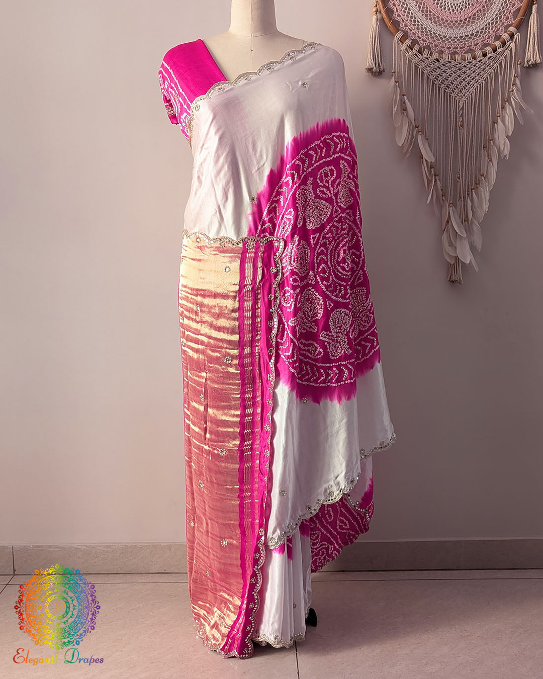 White pink Rasmandal gaji silk saree on mannequin showing full drape and gota patti work